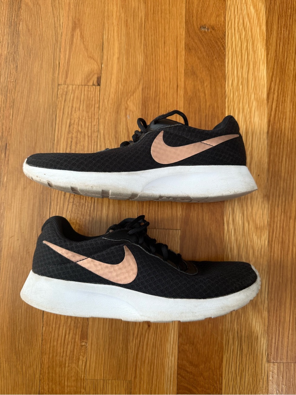 Nike Tanjun Black Sneakers with Rose Gold Swoosh